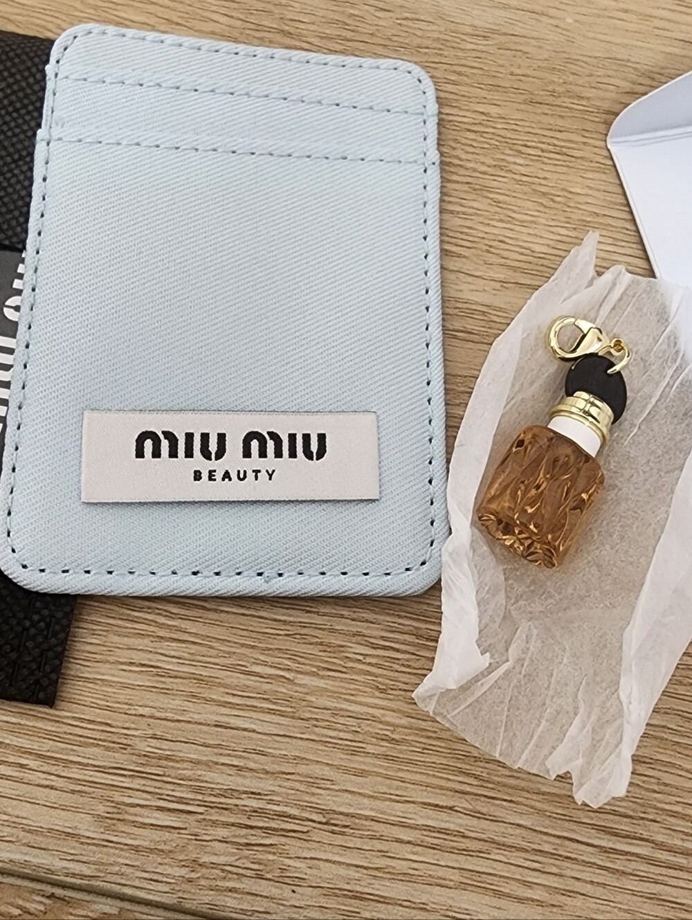 Miu Miu Duo Set Adhesive Phone Card Holder And Charm Bottle Pendant - Picture 4 of 4